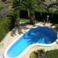 Click for full size image of Holiday in Narja - View from roof terrace to pool