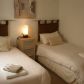 Click for full size image of Apartments in Nerja - Twin bedroom