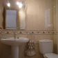 Click for full size image of Apartments in Nerja - Bathroom with bath and overhead shower