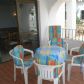 Click for full size image of Terrace with table and chairs