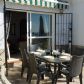 Click for full size image of Villas in Nerja - Terrace with table and chairs