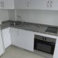 Click for full size image of Nerja Apartments - Kitchen