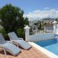Click for full size image of Villas in Nerja - Pool area with view of Town and Mountains