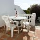 Click for full size image of Villas in Nerja - Terrace with table and chairs