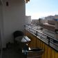 Click for full size image of Apartments in Nerja - Terrace with table, chairs and view of area