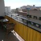 Click for full size image of Apartments in Nerja - Terrace with table, chairs and view of area