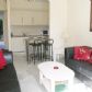 Click for full size image of Living Room/ Kitchen