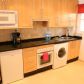 Click for full size image of Holiday Nerja - Kitchen