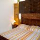Click for full size image of Carabeo 1 Studio - Bedroom