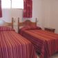 Click for full size image of Holiday in Nerja - Front Bedroom