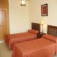 Click for full size image of Nerja Apartments - Twin Bedroom
