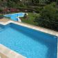 Click for full size image of Views of pools from villa - Holiday villas nerja