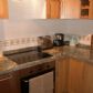Click for full size image of Nerja Apartments - Kitchen