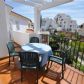 Click for full size image of Nerja Apartments - Balcony with Table and Chairs