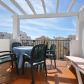 Click for full size image of Nerja Apartments - Balcony with Table and Chairs