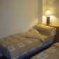 Click for full size image of Twin Bedroom