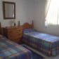 Click for full size image of Twin Bedroom