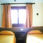 Click for full size image of Twin Bedroom