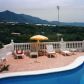 Click for full size image of Pool view - Villas nerja