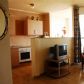 Click for full size image of Apartments Costa Del Sol - Lounge/ Kitchen