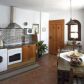 Click for full size image of Apartments in Nerja - Kitchen and dining area