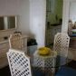 Click for full size image of Dining Area - Holiday Apartments