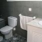 Click for full size image of Nerja Townhouses - Bathroom