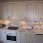 Click for full size image of Kitchen - Holiday Apartments Nerja Costa del Sol Spain