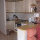 Click for full size image of Holiday Apartments Nerja - Kitchen
