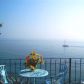 Click for full size image of Holiday in Nerja -PATIO ENTRANCE TERRACE ON THE SEASHORE