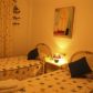 Click for full size image of TWIN BEDROOM