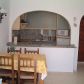 Click for full size image of Apartments Nerja - Dining Room & Kitchen
