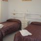 Click for full size image of Bedroom