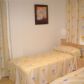 Click for full size image of Holiday Villas Nerja - Twin Bedroom
