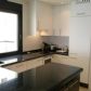 Click for full size image of Apartments Nerja - Kitchen